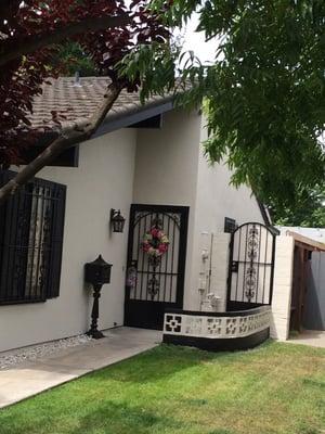 Another exterior painting job with wrought iron  painting