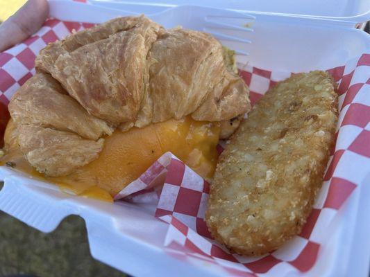 Egg and cheese croissant with hashbrown