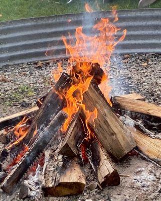 Fire pit with Adirondack chairs