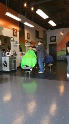 The youngest getting a Pompadour cut from Michelle