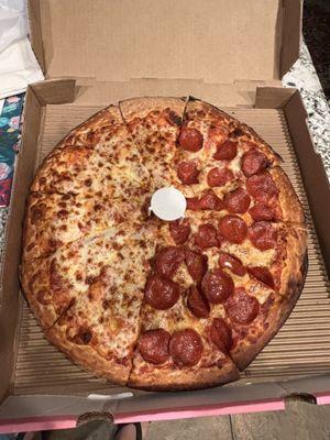 Large half cheese, half pepperoni pizza