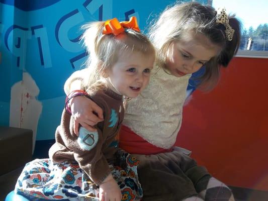 My two happy Heather's customers. Toys, books and clothes, what could be better for two little girls?!