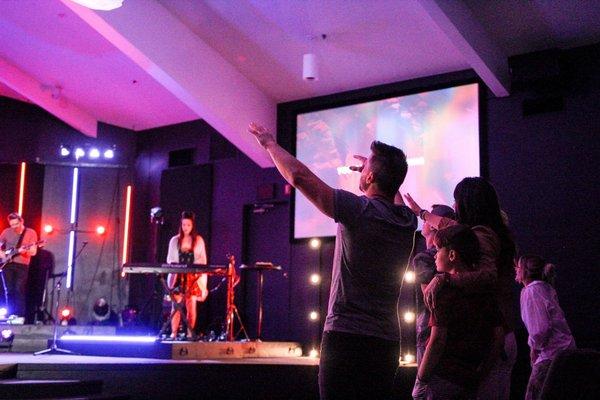 Lead pastor always sits front row worshiping the Lord! So awesome to see.