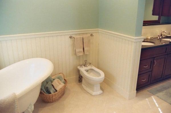 We were able to tuck a bidet in a corner to cover all the bases in this bath remodel.  All the comforts you might want are in...