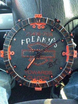 This was my tip for my artist and a gift for Freaky's. I'm a Harley Technician and I like to make clocks out of Harley parts.