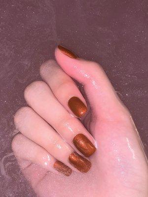 Orange copper gel manicure