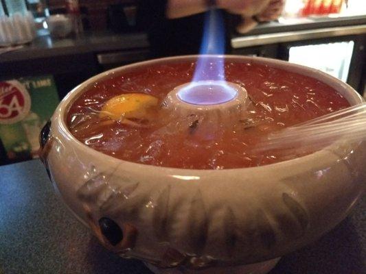 The Flaming Volcano drink. Basically fruit punch with lots of booze