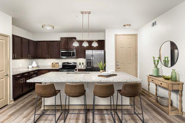 Kitchen with stainless steel appliances at Estates of Richardson