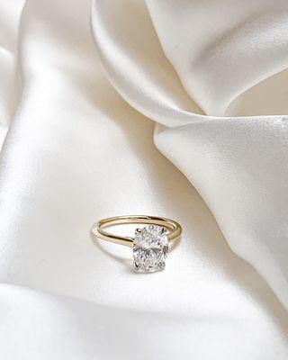 Classic oval solitaire diamond ring