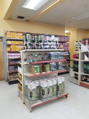 Bird seed and suet near the restrooms (front of store, past registers)