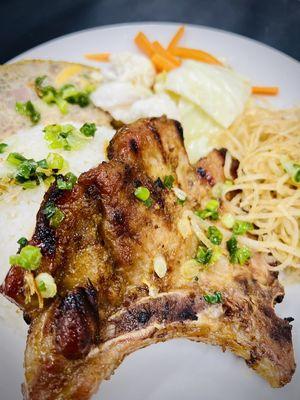 Cơm Sườn Nướng. Grilled pork chops platter.