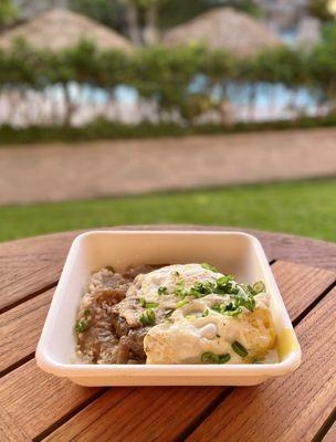 Loco Moco ($21) Local Beef Patty, Eggs, Maui Onion Gravy, Steamed Rice