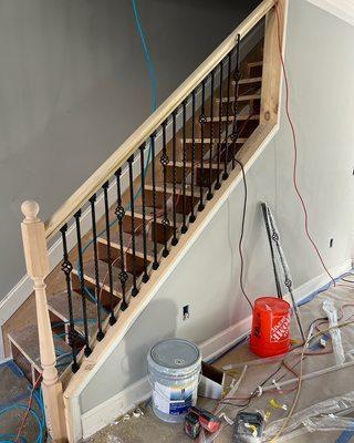 Finished wooden and iron Rod banister