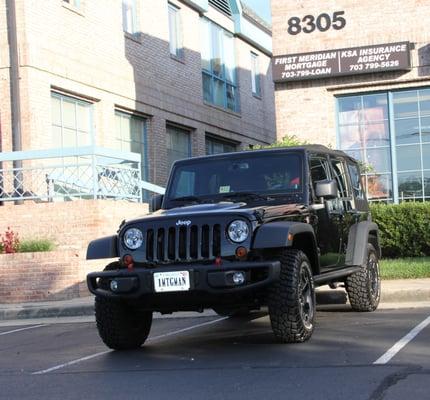 The Official Sign and Car.