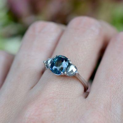 Platinum ring with sapphire and salt & pepper diamonds