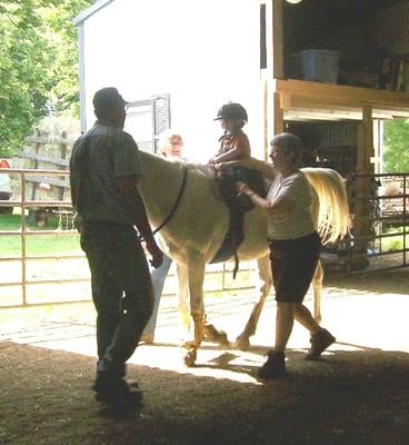 Little kids LOVE our gentle horses we start  4 yr old children in jr lessons and  Children age 5 + in full lessons