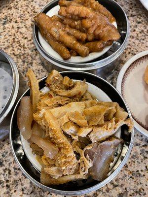 Dim sum dishes- (top) chicken feet (bottom) mixed tapa plate of beef tripe