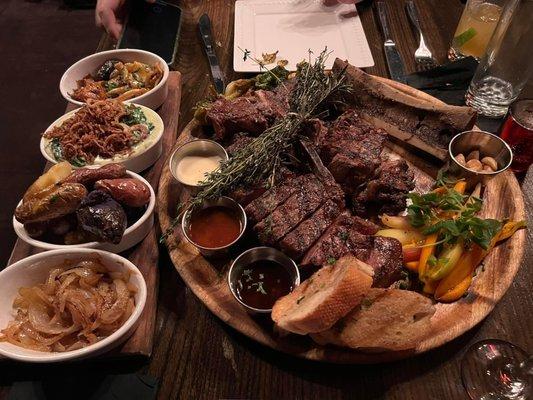 Porterhouse for 2. Sides (front to back) mushrooms, potatoes, cream of spinach, onions. Sauces Demi glacé, dba steak sauce, lemon butter