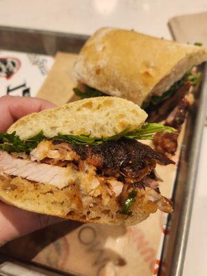 Porchetta sandwich w caramelized onions and arugula. Just like SF