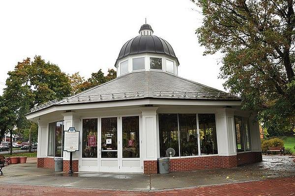 Congress Park Carousel protected from the elements in this glassed-in house