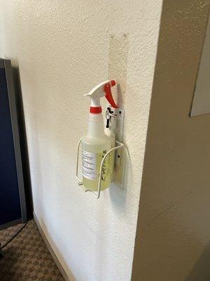 Sanitizing spray in exercise room