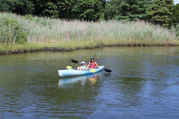 Mom and daughter kayaking