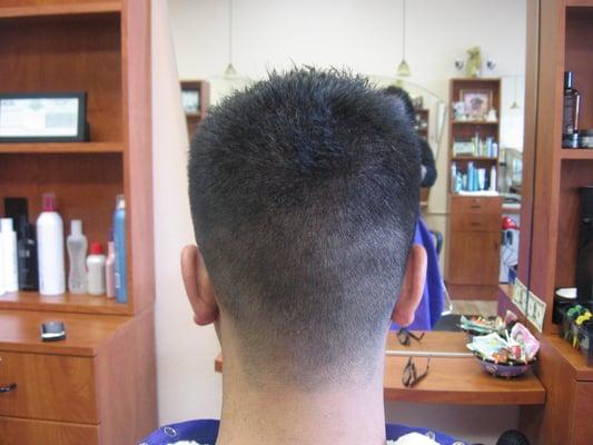 The High and  Tight. Shaved sides and back, blending to a shredded classic clean square cut.
3 of 3