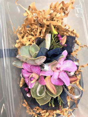 Totally unique and custom prom corsage and boutinniere featuring succulents!