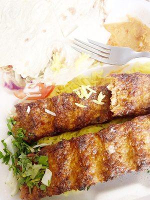 Kebabs with rice and hummus