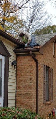 Gutters being cleaned.