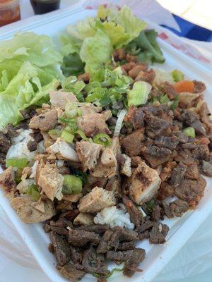 Plate of rice spicy pork and beef. (Ignore the chicken on top....I took it off the other plate I had )