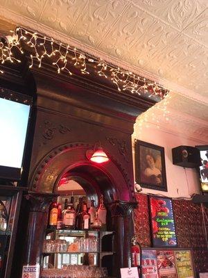 Ornate wood bar, tin ceiling, antique decor...and pull tabs!