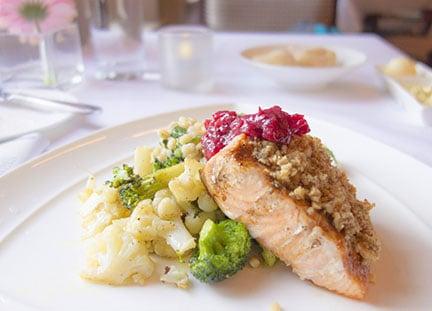 Superb! Walnut crusted salmon. Barley and spinach risotto, garlic roasted broccoli and cauliflower, cranberry mustard jam.