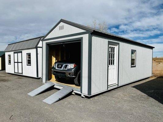 We build Garage Sheds, with Heavy Duty Flooring, and Aluminum Ramps!