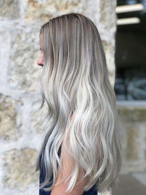 Ashy blonde and root shadow melting