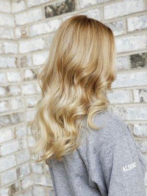 Blonde dimension is the root area with cool blonde ends.