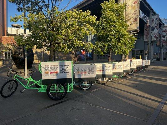 6 Seater pedicabs lined up at Lumen field