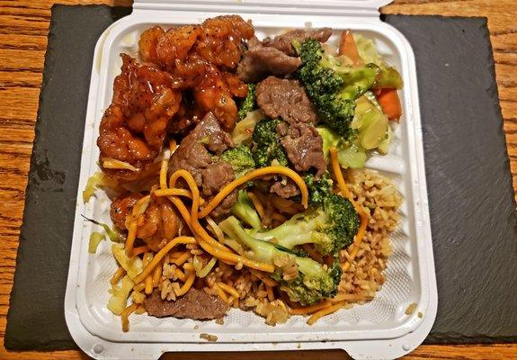 This is a Combo C. Fried rice, Chow Mien, Black Pepper Chicken, Shrimp Chop Suey, Beef and broccoli.