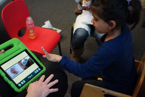 At CPT, we use every tool necessary at our disposal in order to help your child succeed! Here, Jill is working on speech with her kiddo!