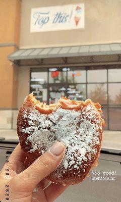 Donut stuffed with strawberry cheesecake ice cream