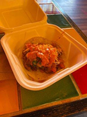 Taco Al Pastor with pico, cheese, and salsa roja