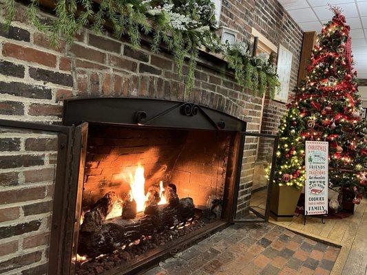 Cozy fireplace in communal lounge.