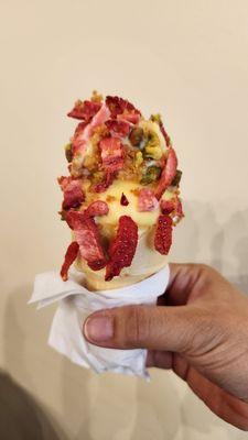 Kiddie cone, dole whip dip, strawberries, toasted coconut and pistachio