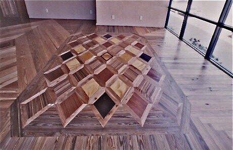 Natural tones of wood creating a wooden rug