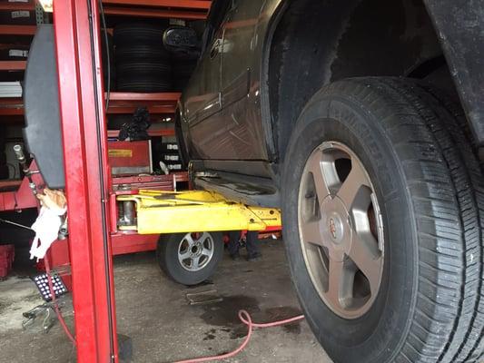 Lift bending running board forcing rubber too plate  to snap away from running board.