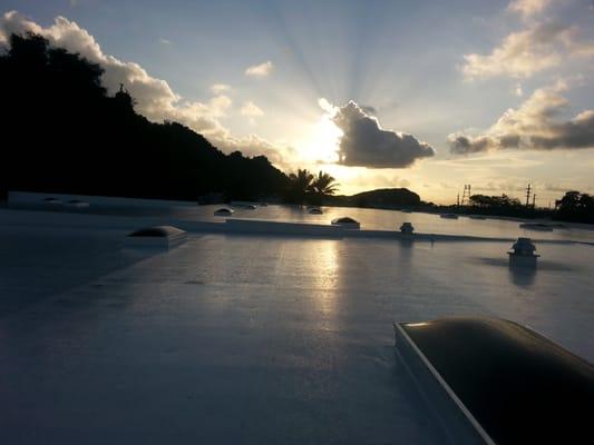 Completed TPO retro-fit over metal existing roof with new skylights