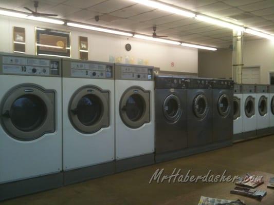 Three different sizes (and prices) of washing machines.