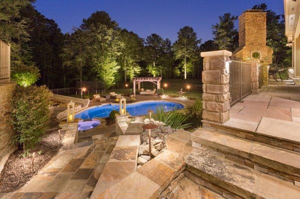 Beautiful outdoor lighting on a property in Atlanta, GA. There are many different types of techniques and lighting in this photo.