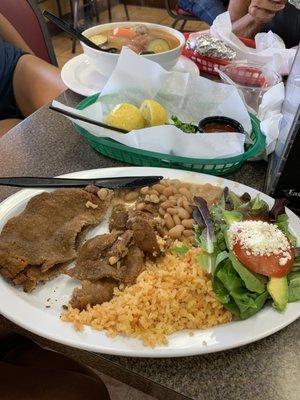 Milanesa plate and albondigas(behind). Must visit again.