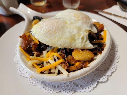 My own skillet corned beef, mushroom and cheese over home fries